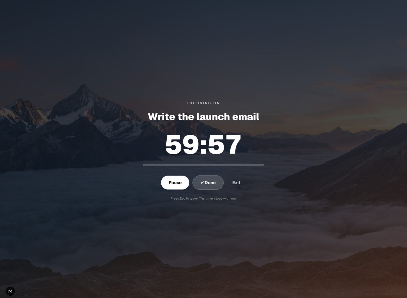 Full-screen focus mode counting down over a mountain landscape